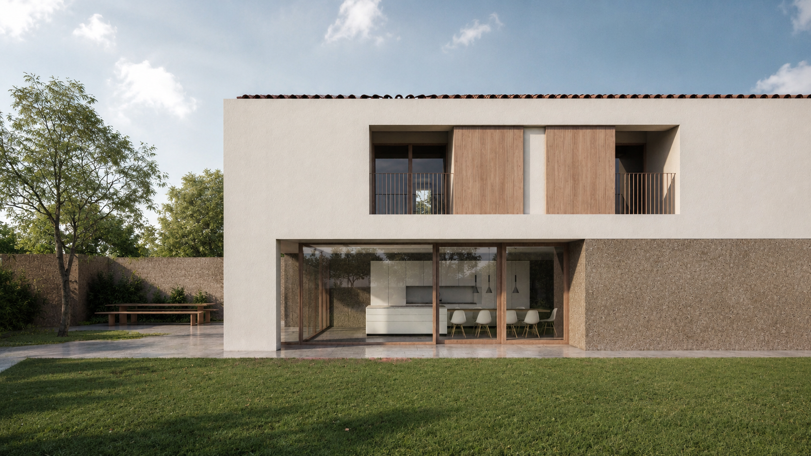 Vista frontale della casa contemporanea con ampie aperture verso il giardino