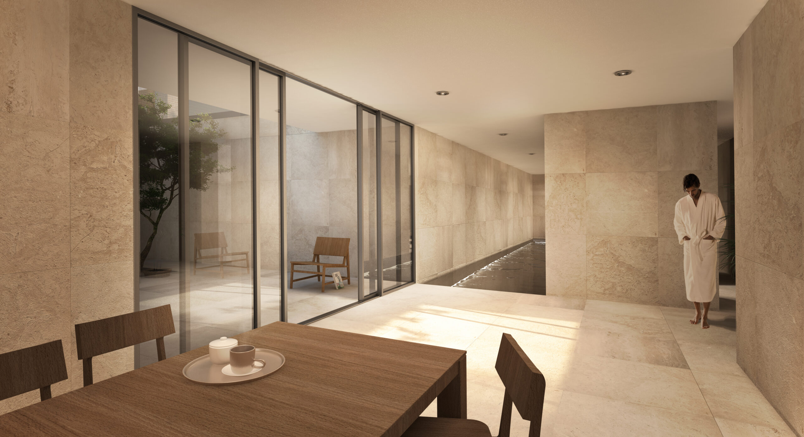 Zona benessere con piscina interna, grandi vetrate e rivestimenti in pietra naturale