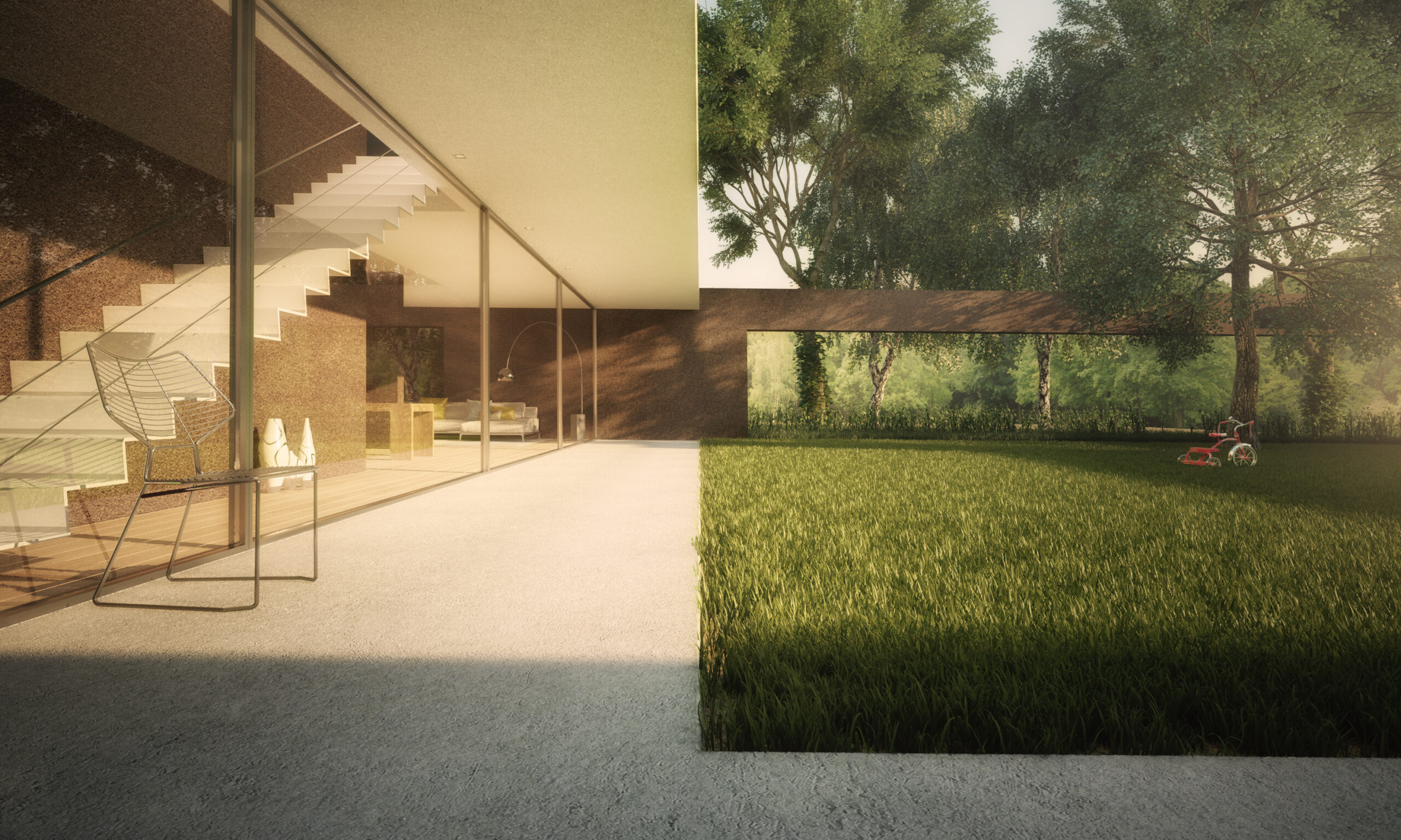 Patio interno della casa con parete vetrata continua e affaccio sul giardino alberato